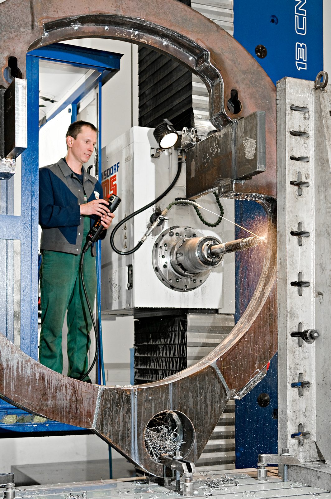 Apprentice machinist training on the CNC milling center at Bock Maschinenbau, certified apprenticeship company in Lorch
