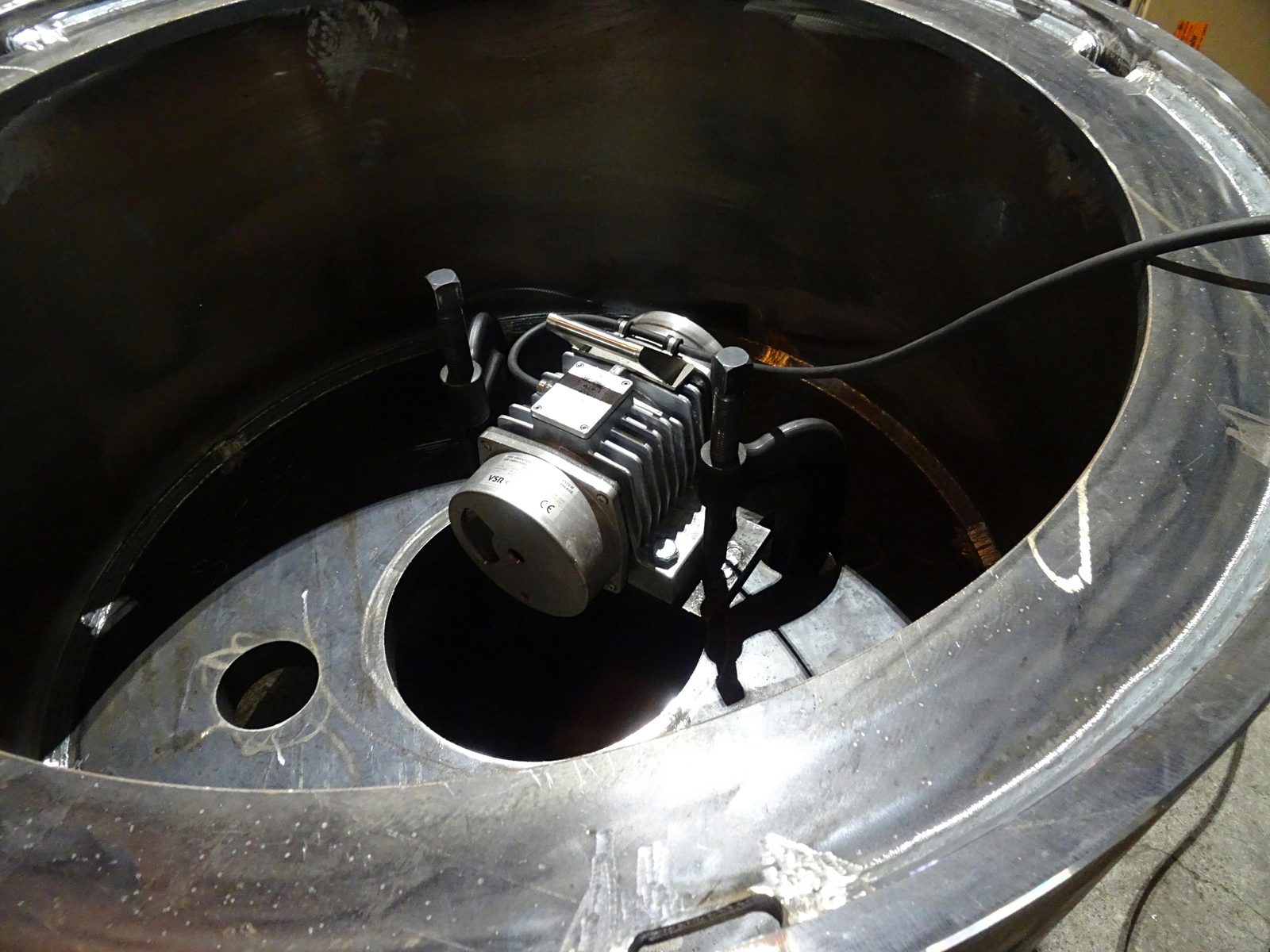 Vibrational stress relief VSR vibration motor assembly for efficient residual stress reduction at Bock Maschinenbau GmbH Lorch